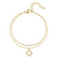 double bracelet with pearls and clover charm